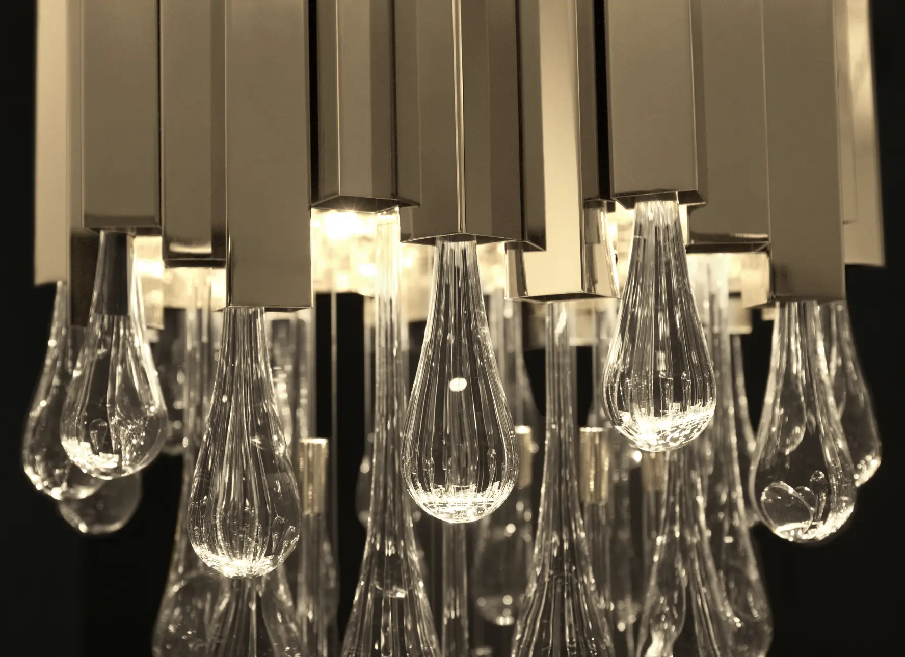 Trump pendant light illuminating modern living room interior